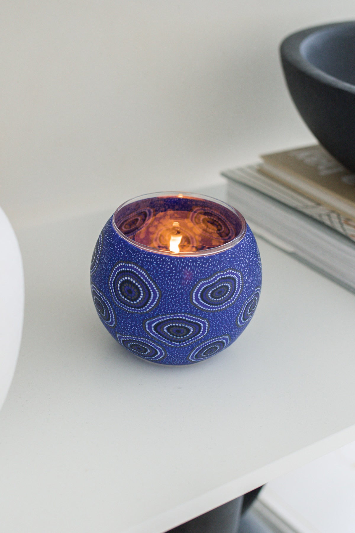 Desert waterholes tea light candle holder with lit candle